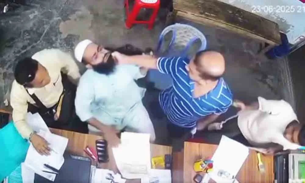 Businessman beaten by beard, shop vandalized