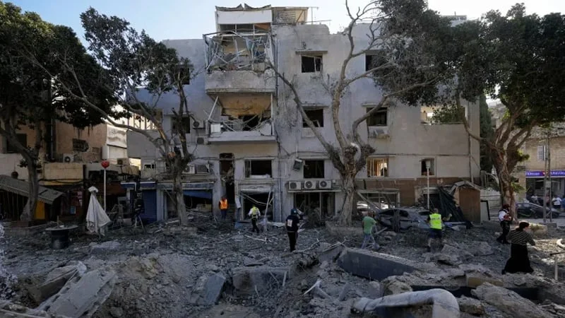 Iran attacks 10 sites in israel, injuring 11