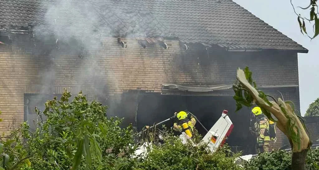 Plane crashes into house, 2 killed