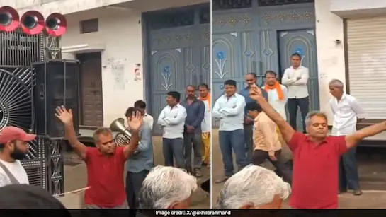 Another friend danced with a loudspeaker next to his dead body