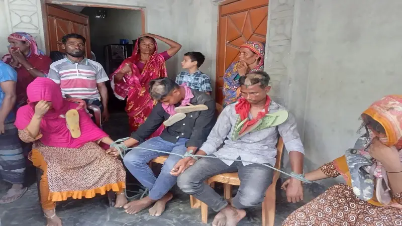 Two friends arrested for having an objectionable relationship with the wives of two expatriate brothers