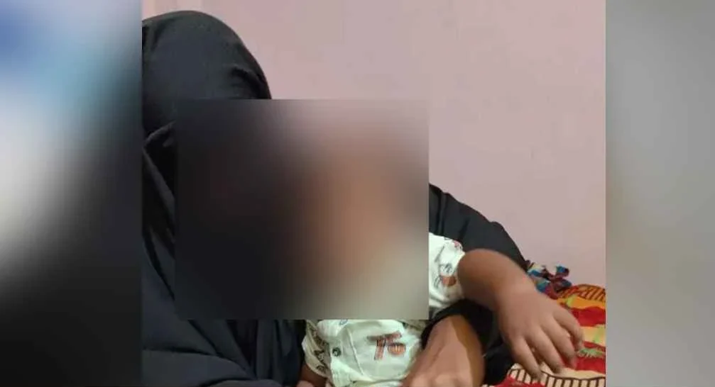 Young woman with children on hunger strike at boyfriend's house demanding marriage