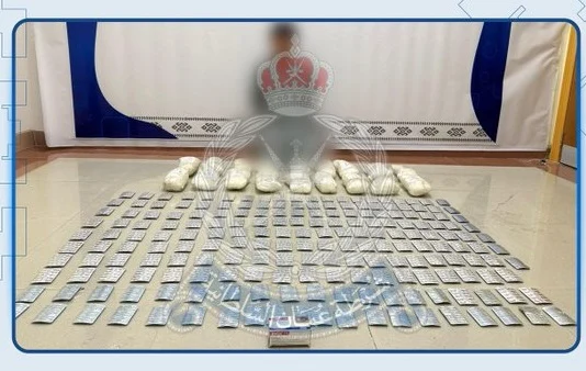 Asian national arrested