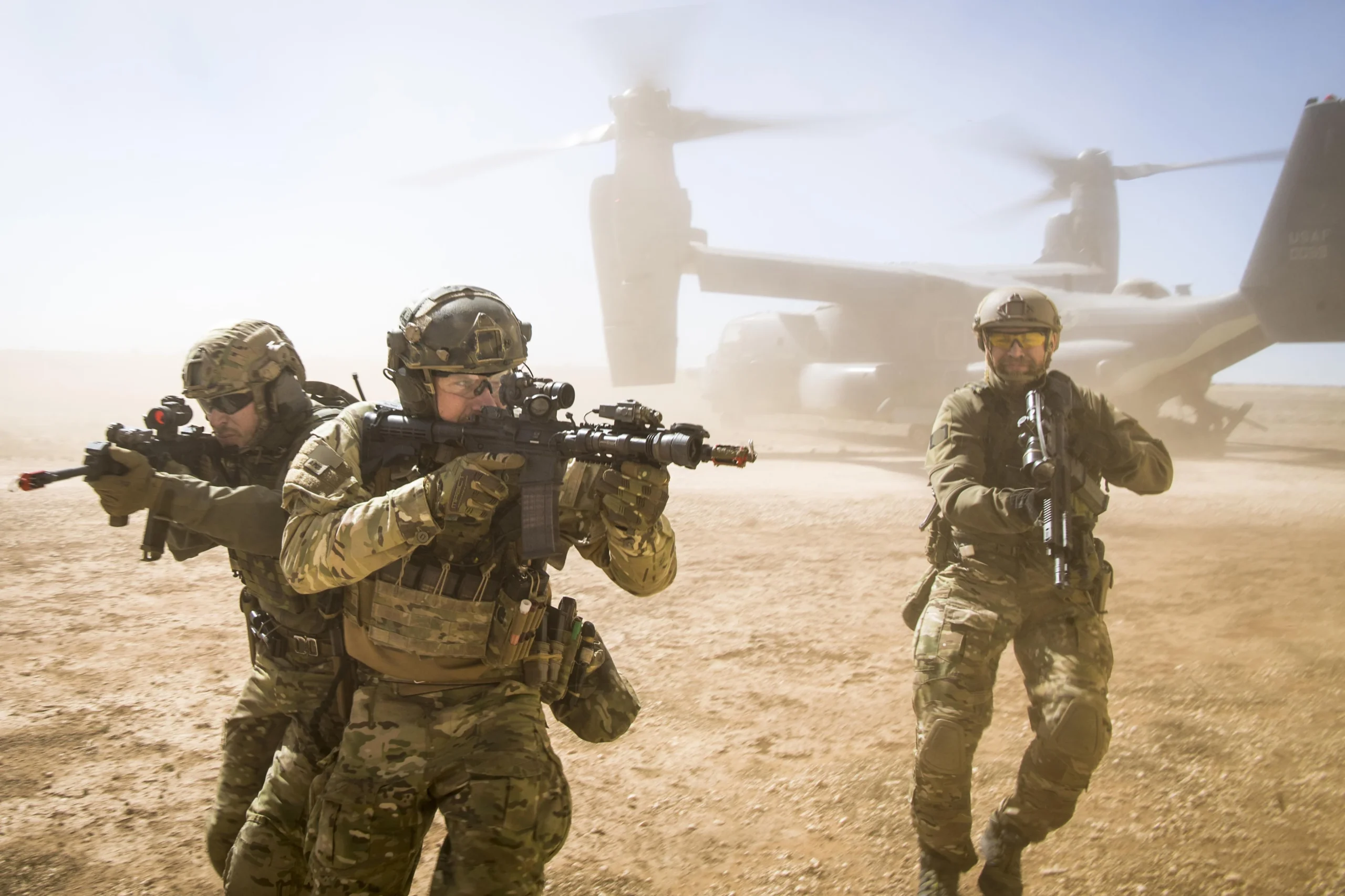 A joint special forces team moves together out of an Air Force CV 22 Osprey aircraft, Feb. 26,
