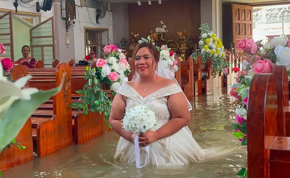 AFP 20260901 C6Z28NR v3 HighRes TopshotPhilippinesWeatherFloodsWedding 1200x740